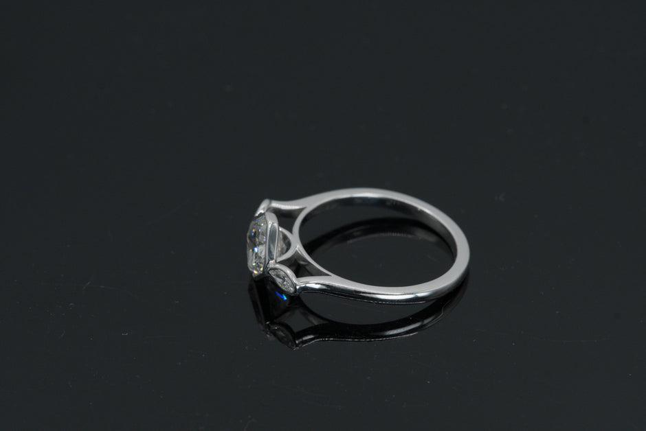Luxe Cushion Cut Diamond Ring with Marquise Accents