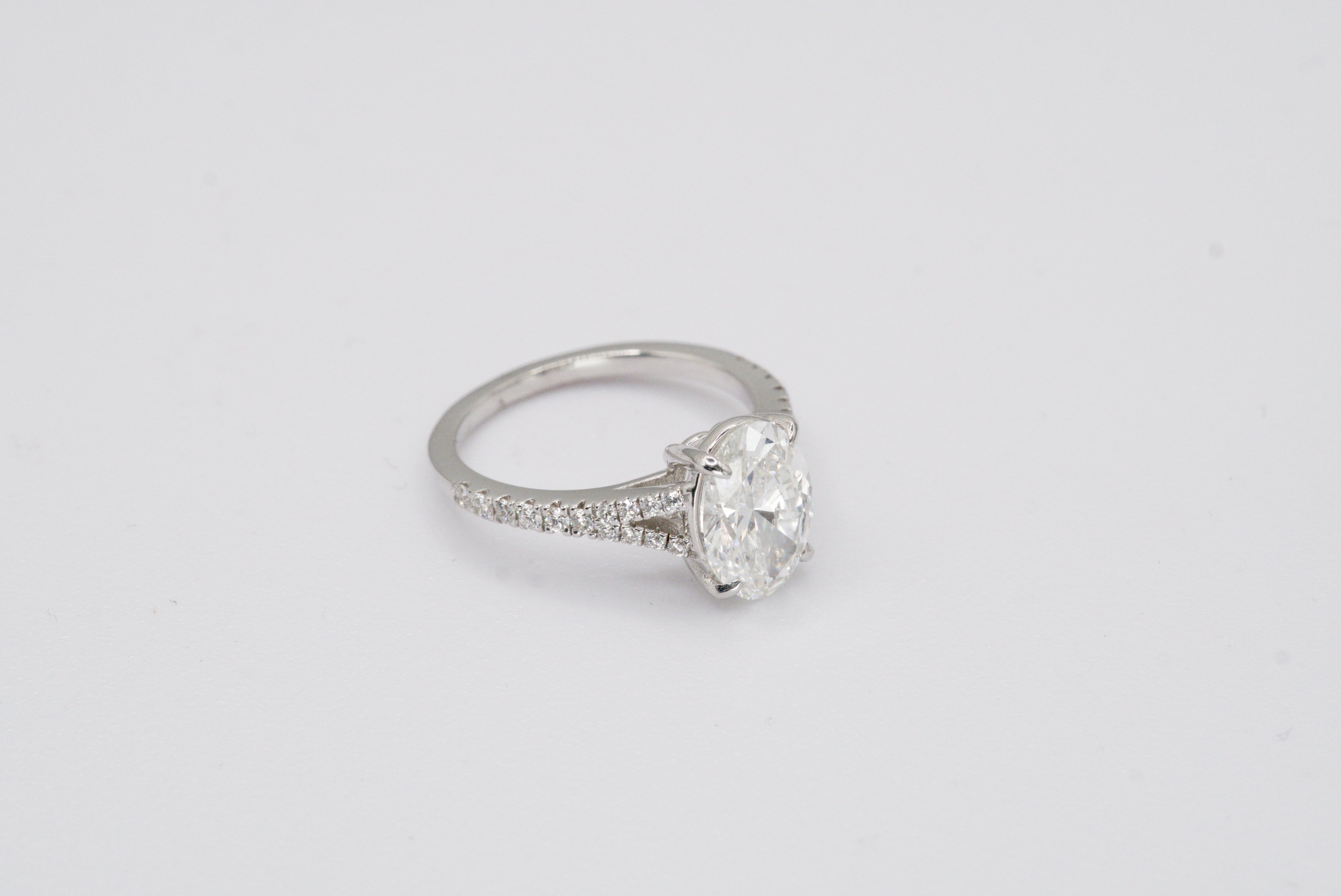 IGI Certified Oval Diamond Solitaire Split Shank Ring in White Gold