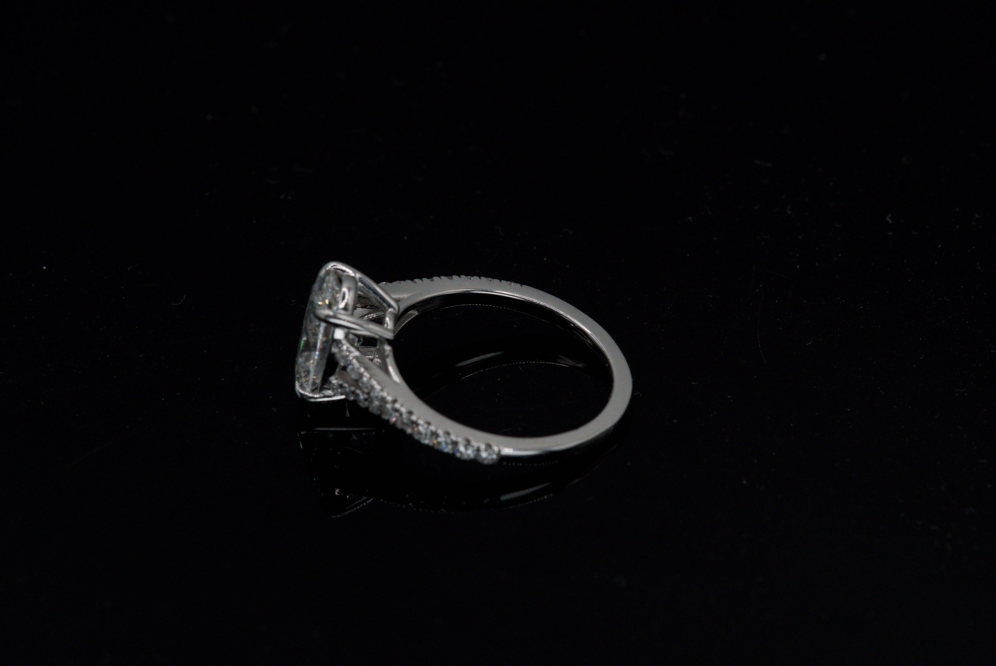 IGI Certified Oval Diamond Solitaire Split Shank Ring in White Gold