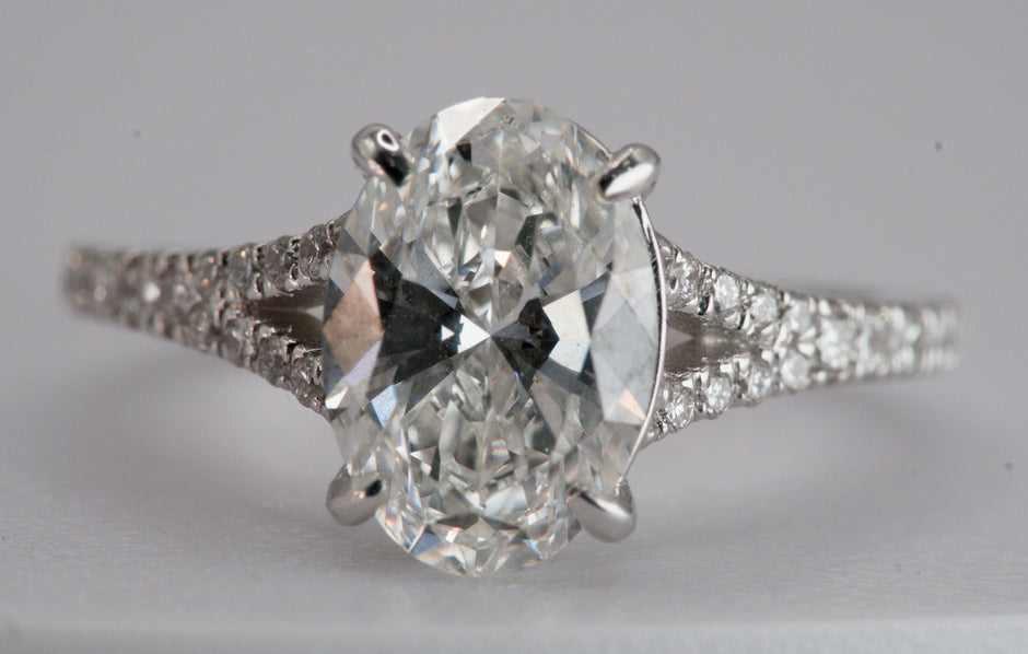 IGI Certified Oval Diamond Solitaire Split Shank Ring in White Gold